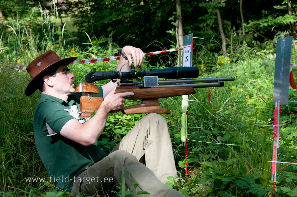 The surface of the hamster (and knee pad) must be flat and not shaped to provide lateral support to the rifle.